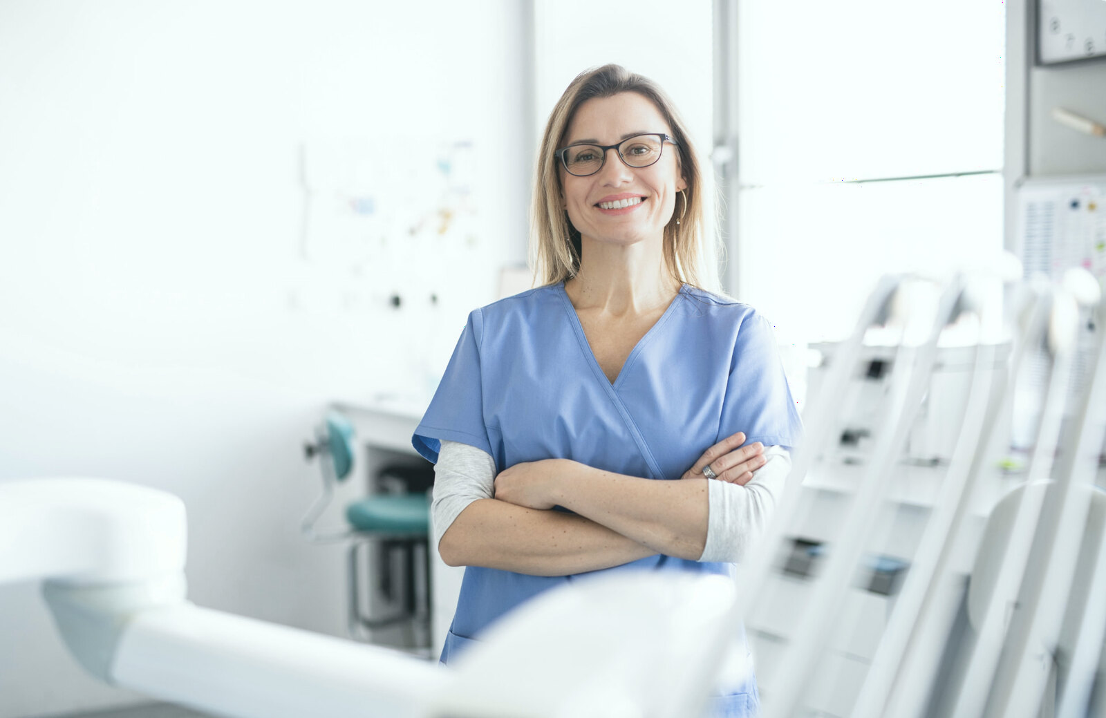 Portrait of a smiling dentist in her practice