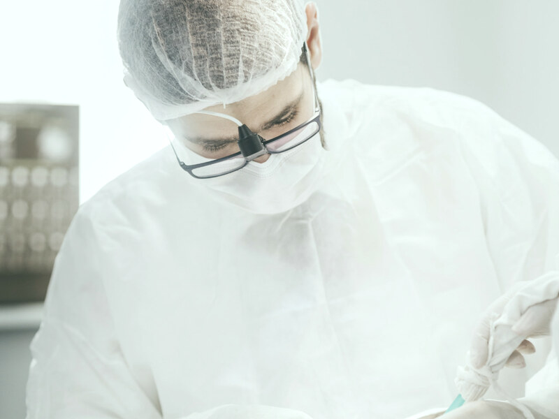 Dentist reviewing an X-ray with a patient